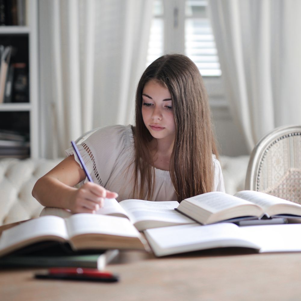 img of a girl doing school